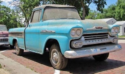 a 1958 Chevrolet Cameo pickup with just over one mile on the odometer waits for the right buyer